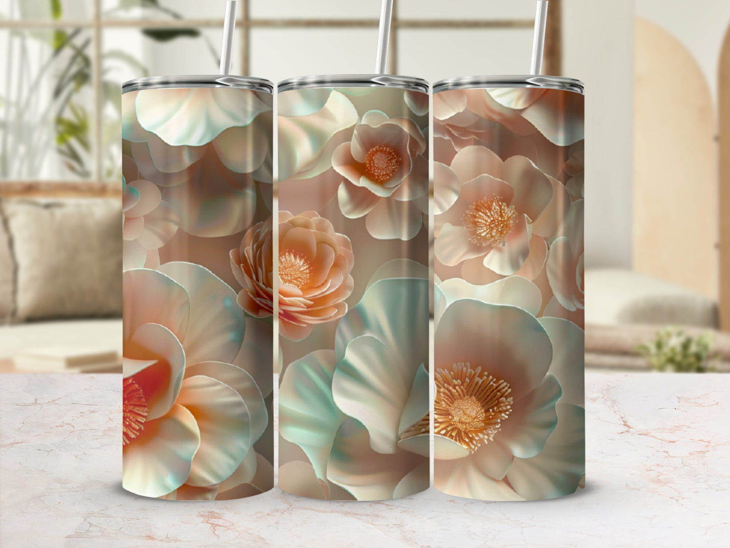 Triptych of tumblers with large, stylized floral patterns in soft peach and teal.