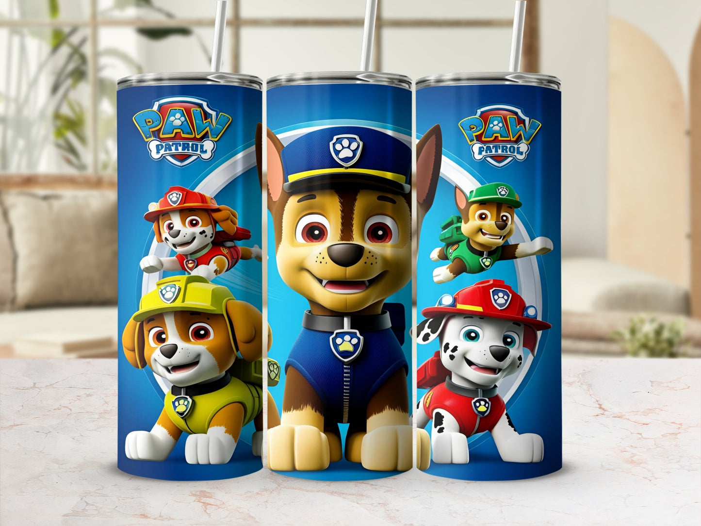 Paw Patrol characters Chase, Marshall, and Rubble on blue tumblers.
