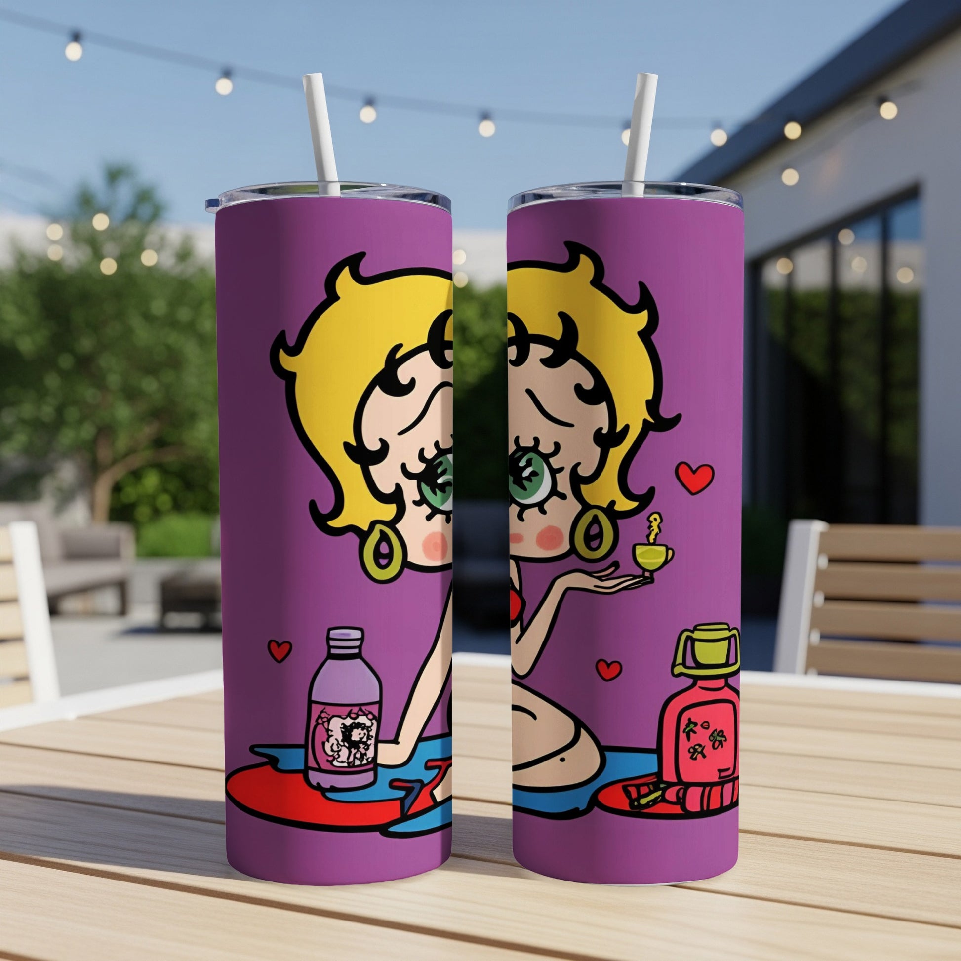 Two Betty Boop tumblers with purple background and cartoon illustration.