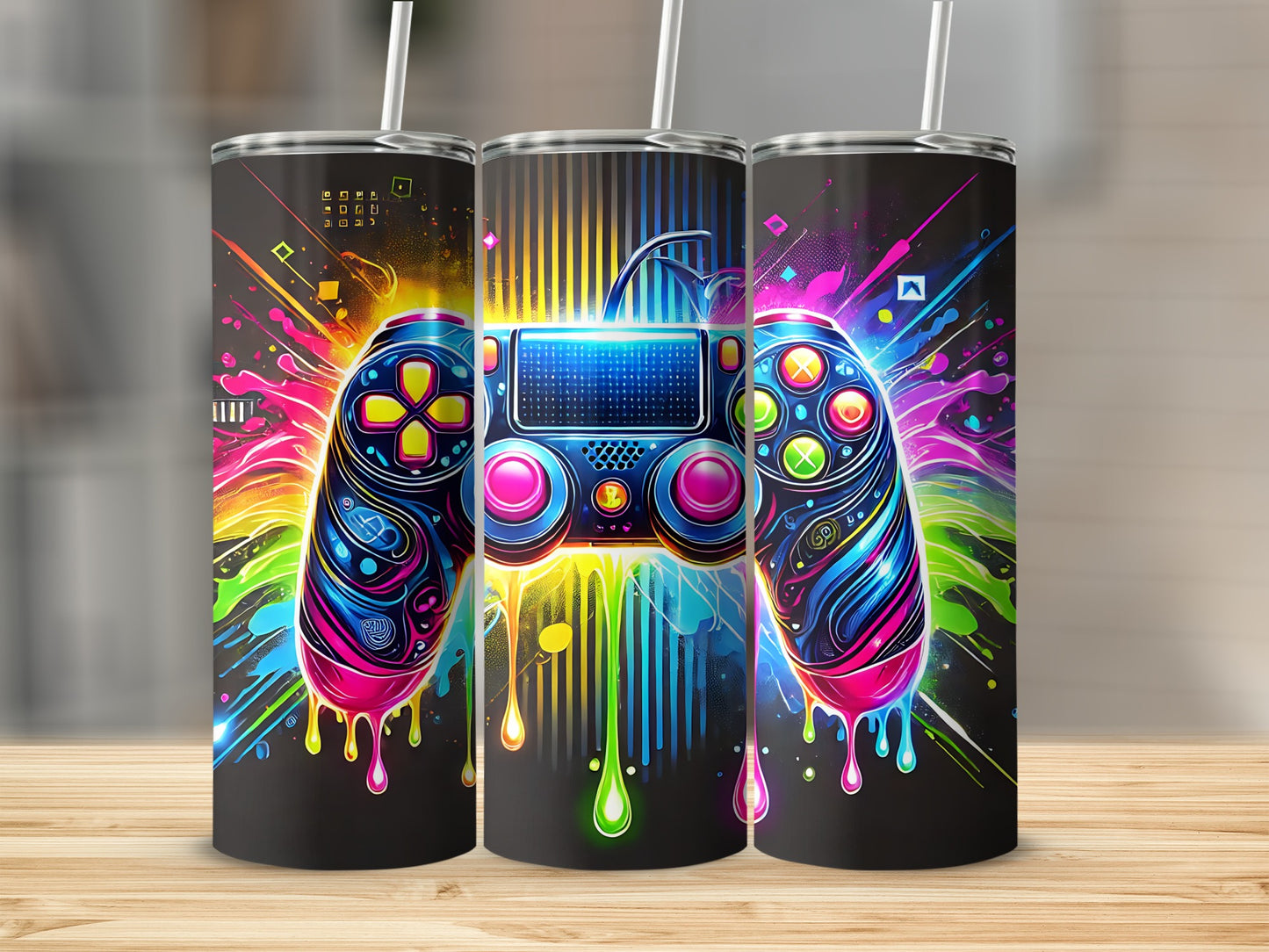 Three tumblers featuring a colorful, abstract video game controller design.