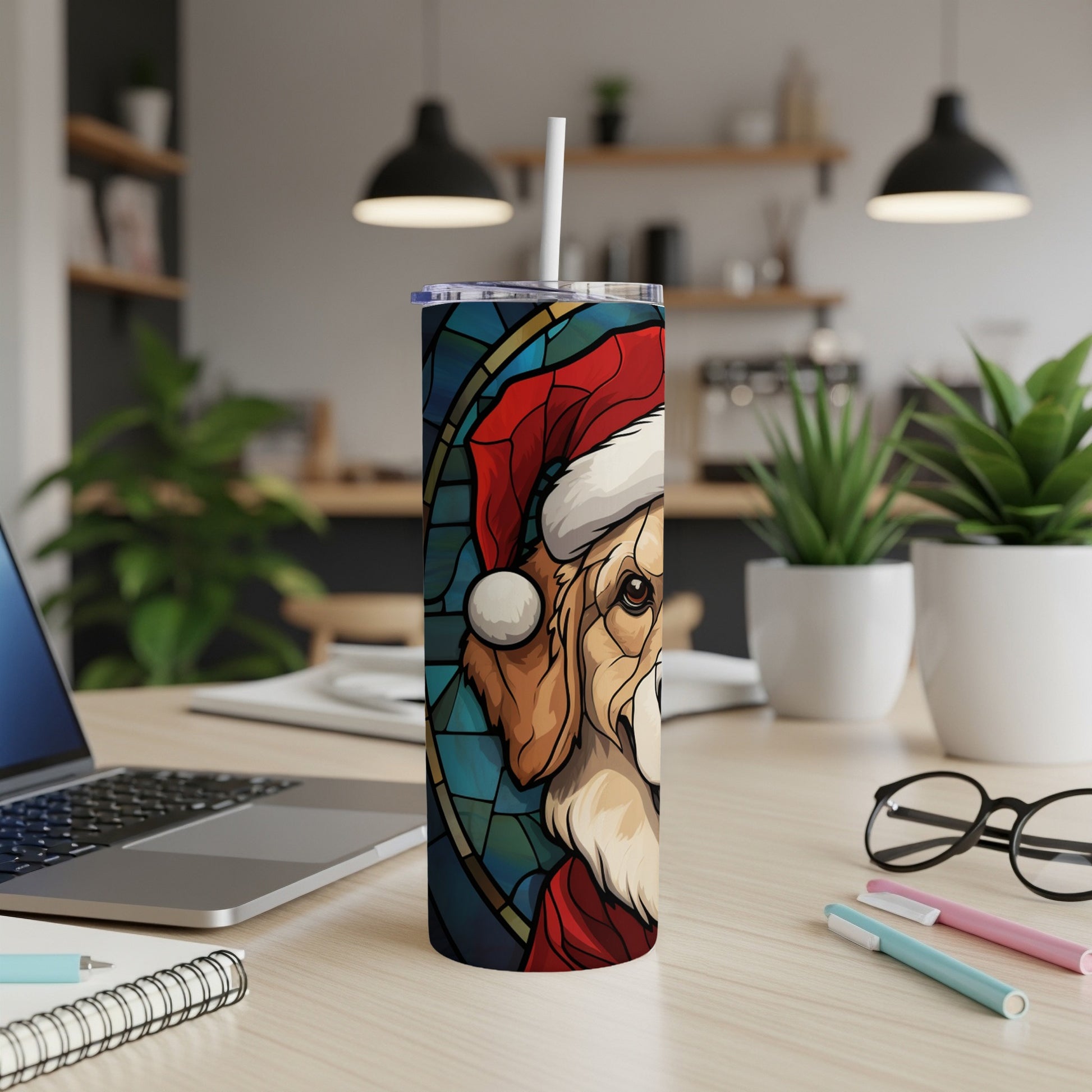 Santa hat-wearing dog on a stained glass-style tumbler.