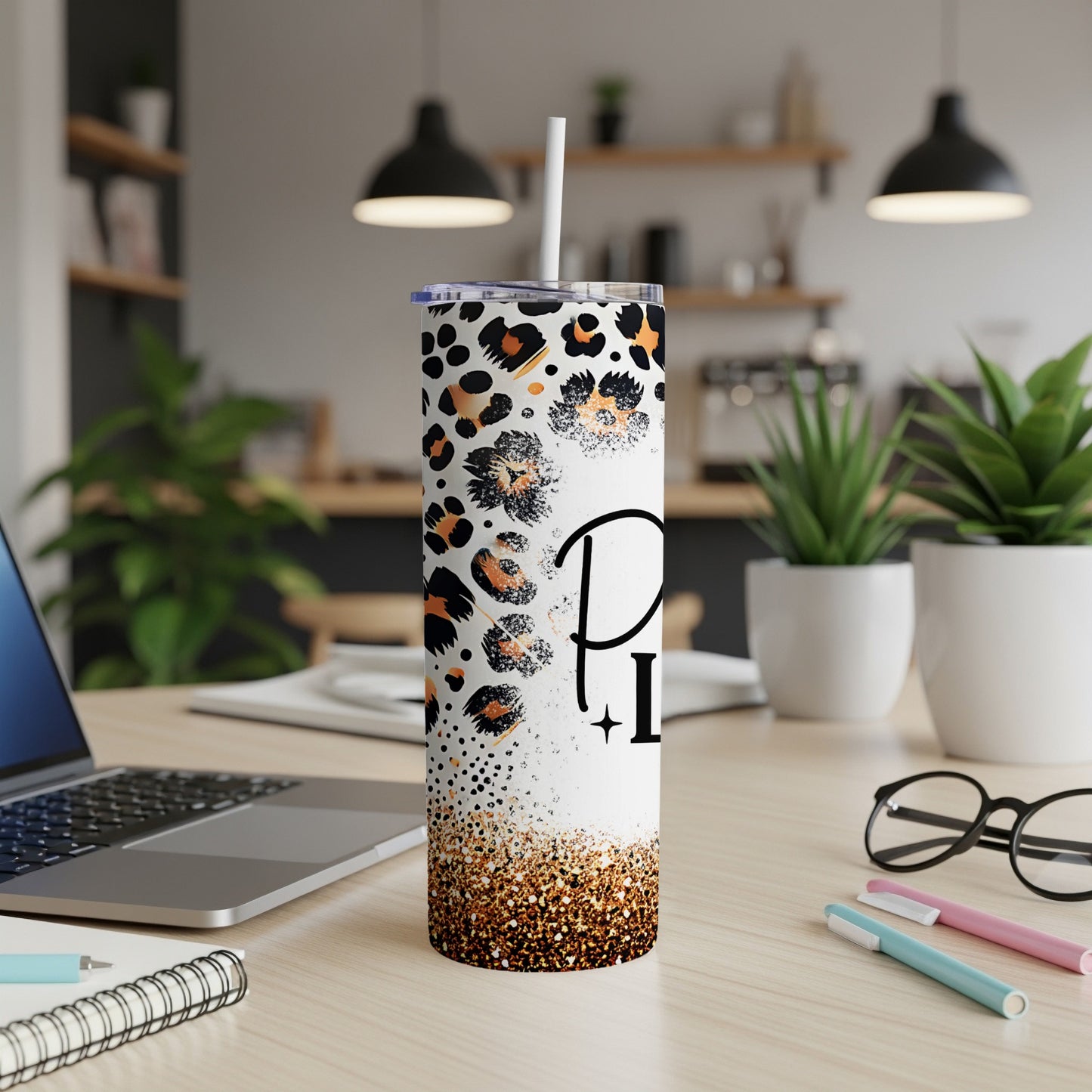 White tumbler with leopard print and gold glitter, "P" initial.