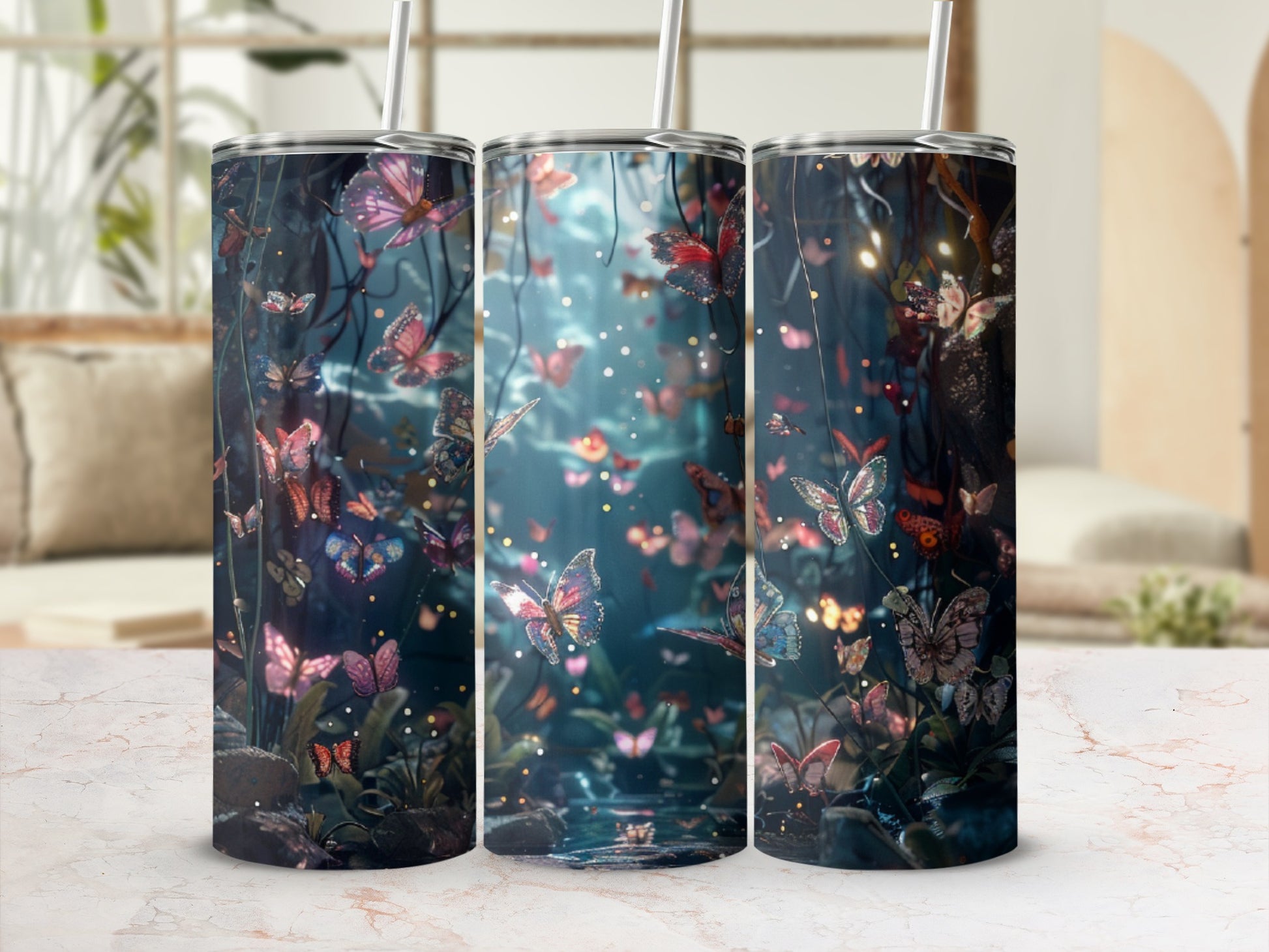 Three tumblers with a starry night sky and butterflies design.