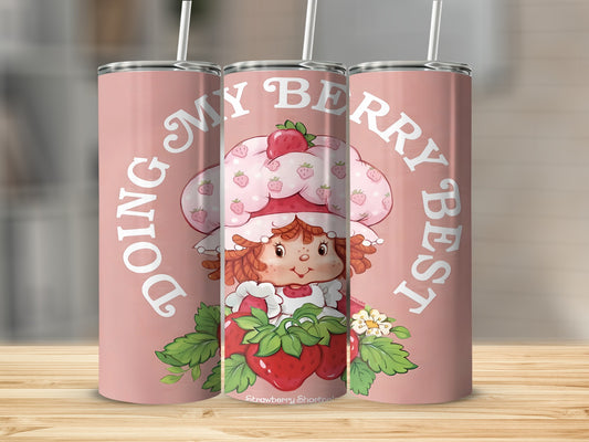 Strawberry Shortcake character on pink tumbler with "Doing My Berry Best" text.