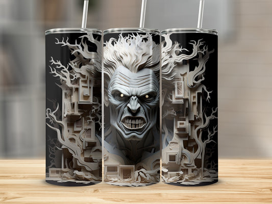 Three tumblers feature a monstrous face with glowing eyes and a forest of paper-cut trees.