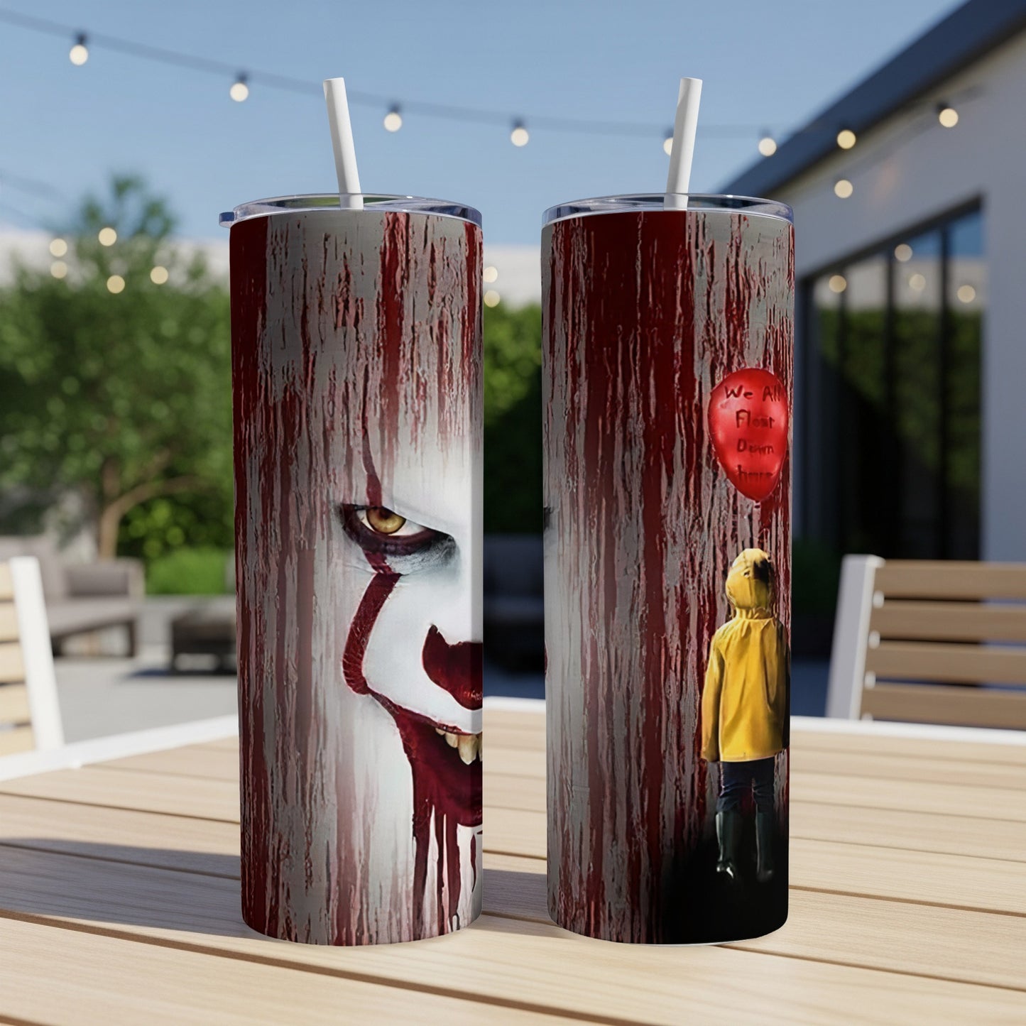 Tumbler with IT movie Pennywise and Georgie in yellow raincoat with red balloon.