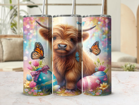 Highland cow with colorful Easter eggs and butterflies.