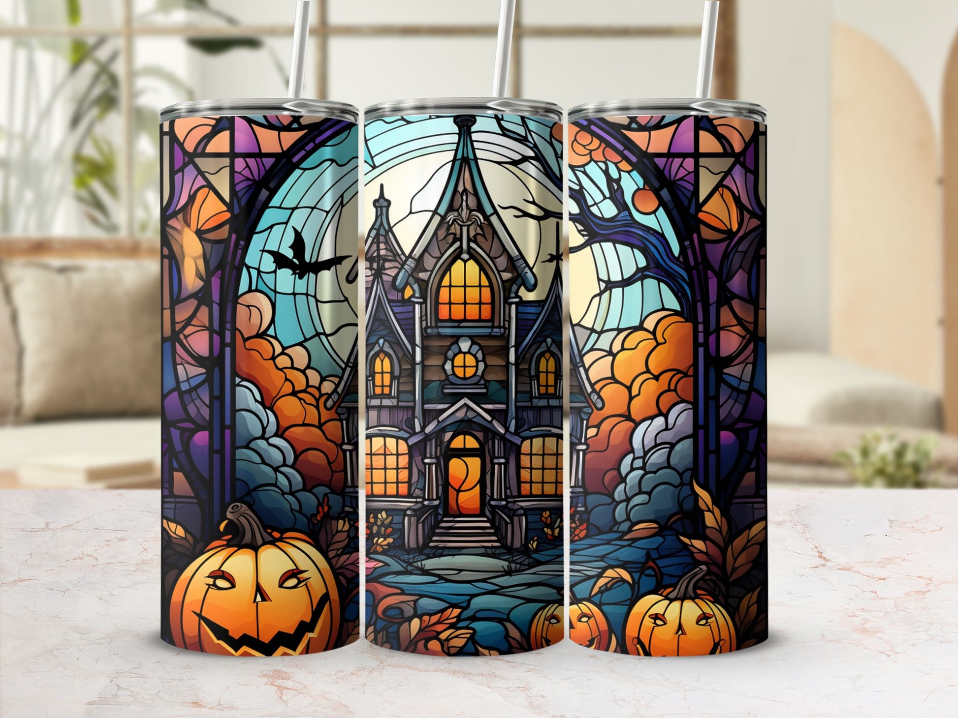 Spooky haunted house and pumpkins on stained glass-style tumbler.