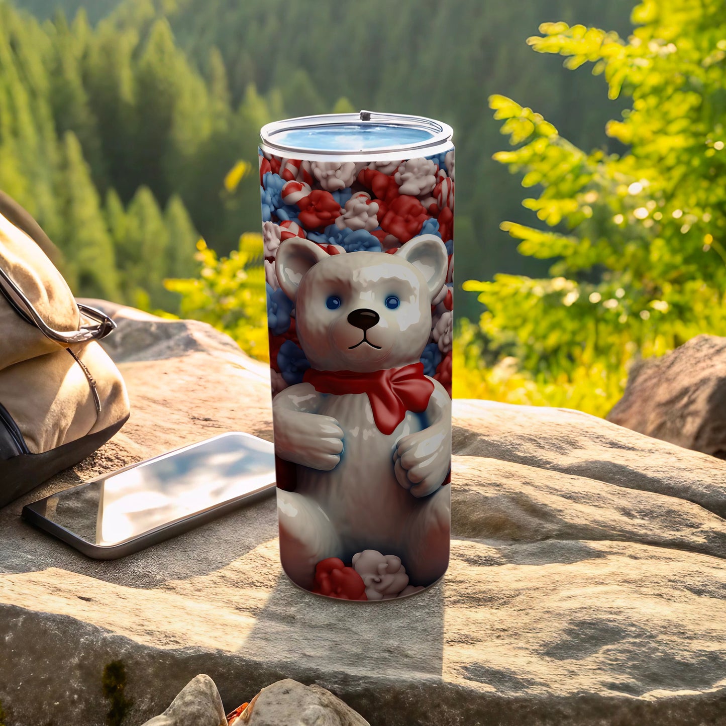 White teddy bear tumbler with red, white, and blue floral pattern.