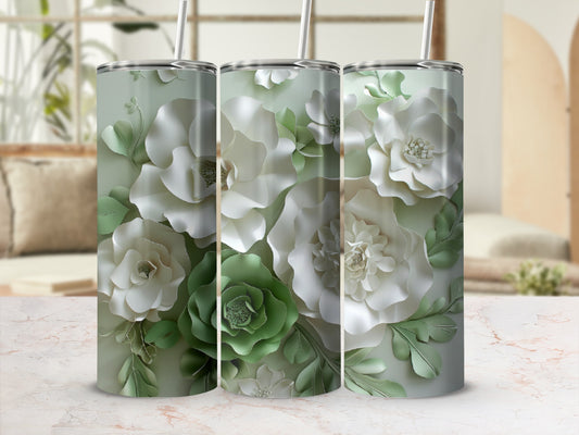 Three pastel green tumblers with white floral and leaf designs.
