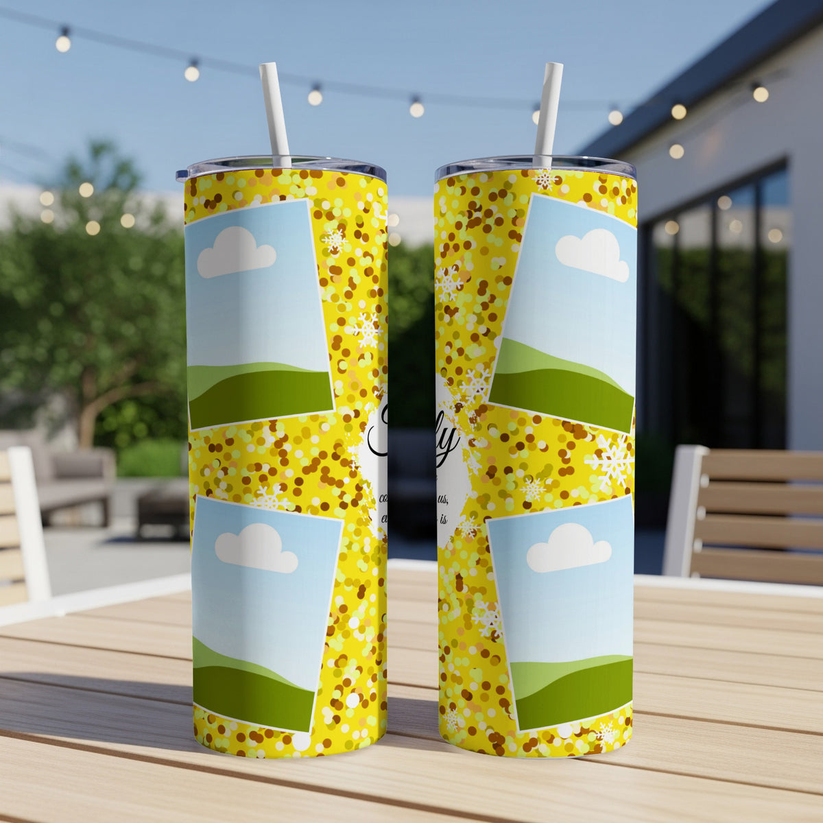 Two yellow tumblers with glitter, photos, and text on an outdoor table.