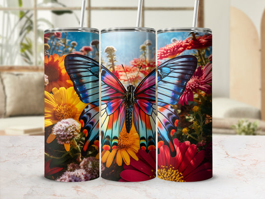 Tumbler with colorful butterfly and floral pattern.