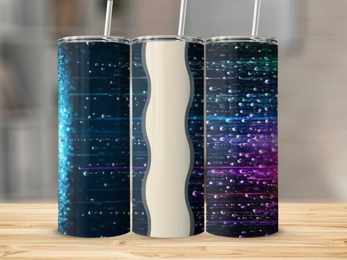 Three insulated tumblers with colorful light streaks and water droplets.