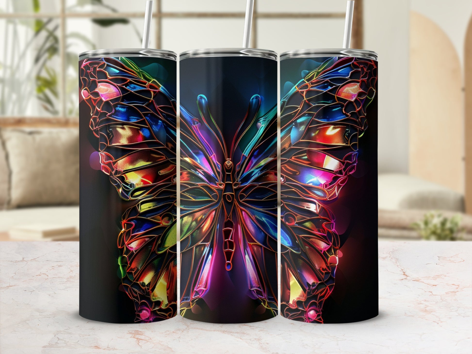 Three tumblers with stained-glass butterfly designs and black backgrounds.