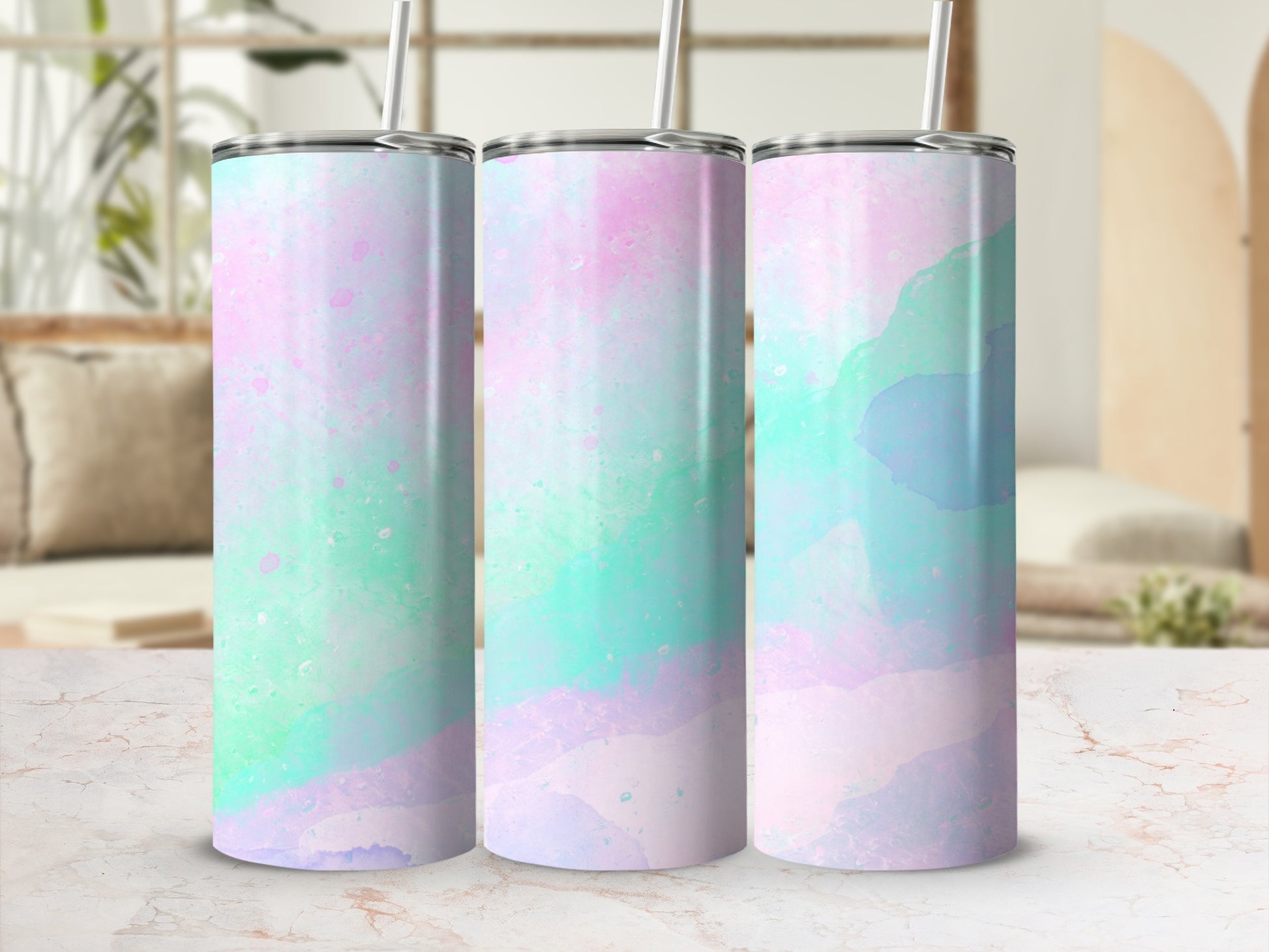 Three tumblers with a pastel watercolor splash design.
