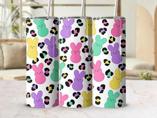 Tumbler with pastel bunny and leopard print pattern.
