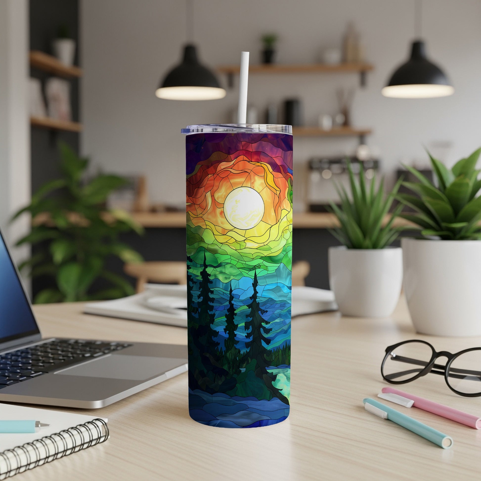 Rainbow stained glass tumbler with moonlit forest scene.
