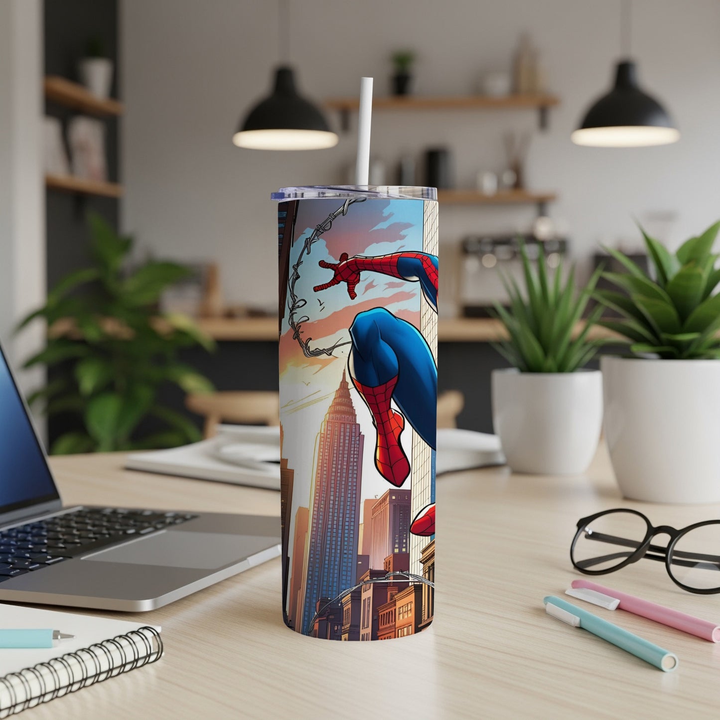 Spiderman in cityscape on a stainless steel tumbler with straw.