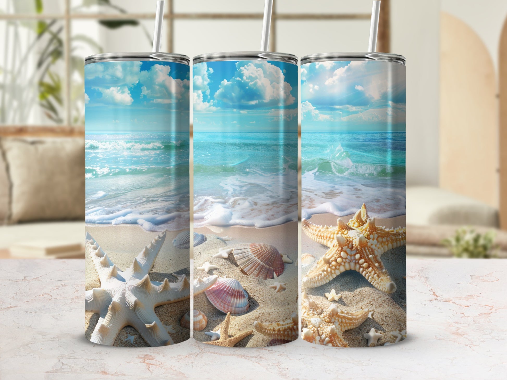 Three tumblers with beach scene and seashells on sand.