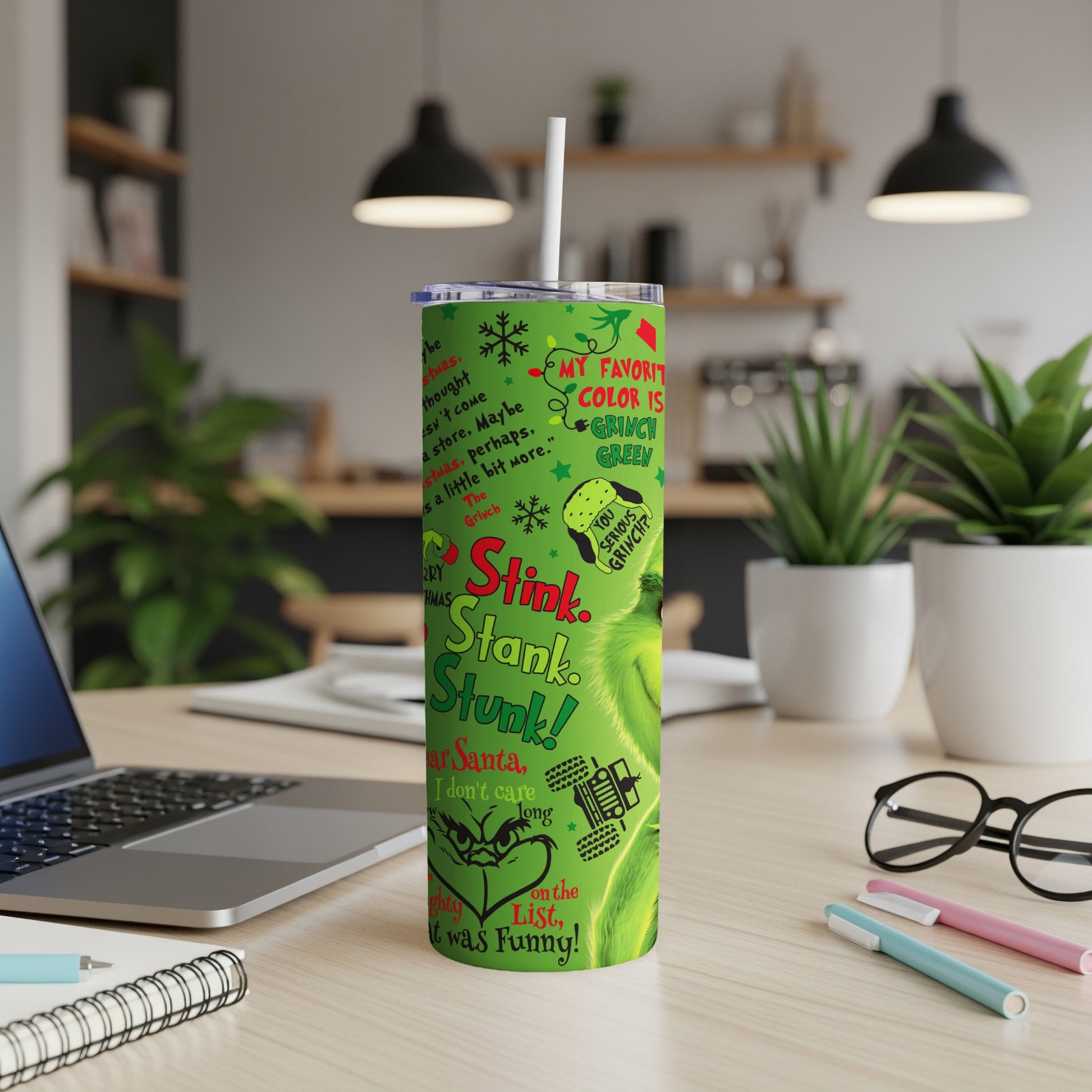 Green Grinch tumbler with "Stink. Stank. Stunk!" text and character illustrations.