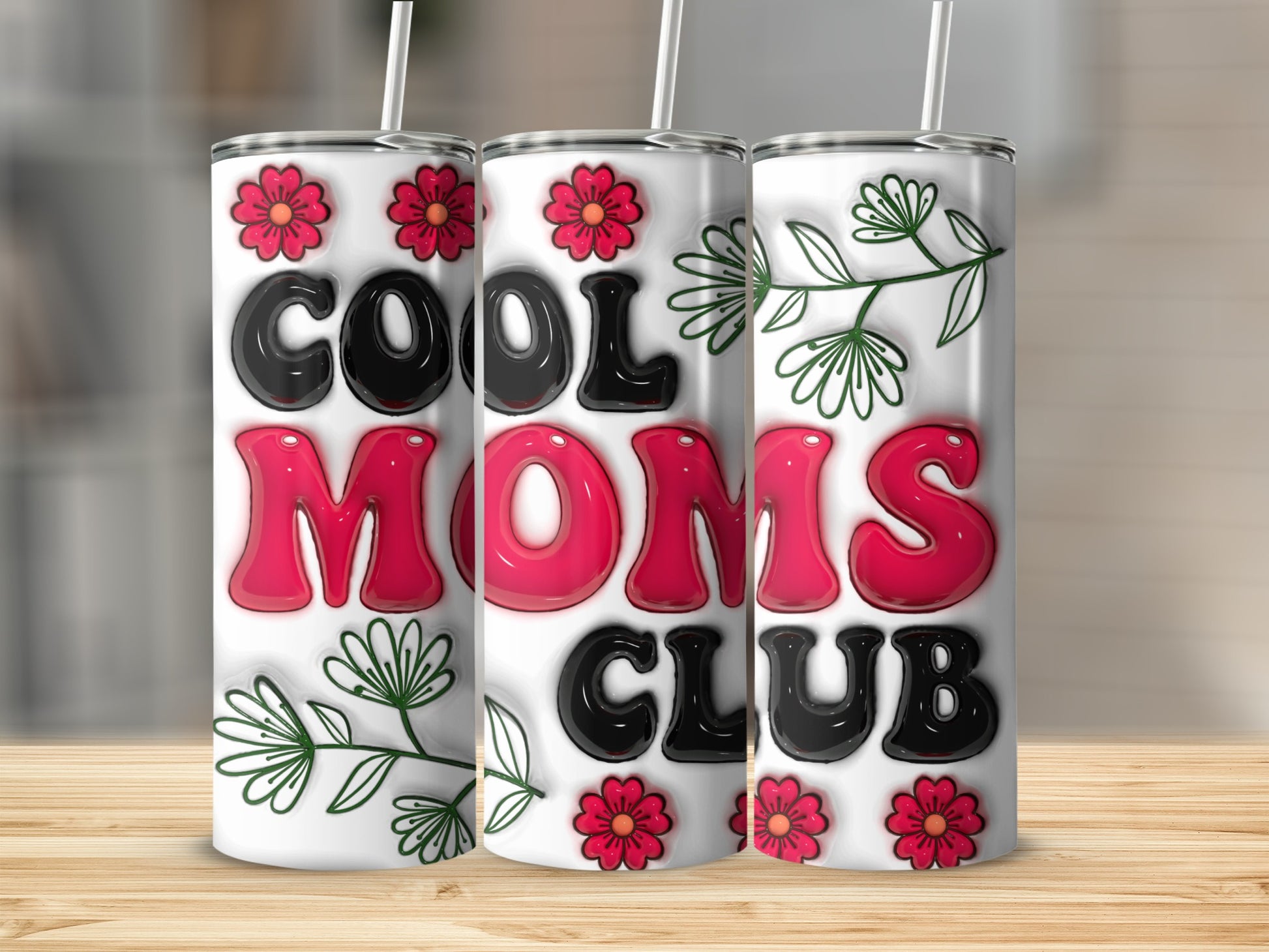 "COOL MOMS CLUB" text on three tumblers with floral accents.