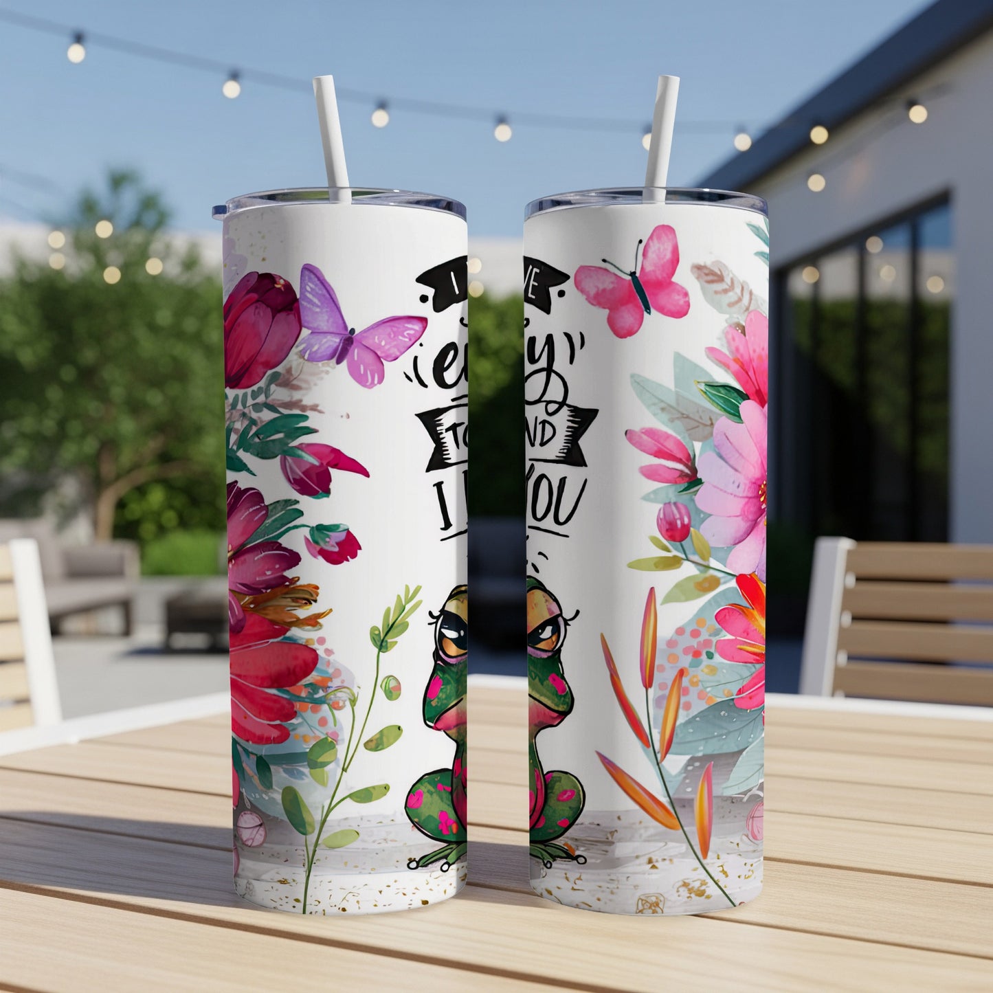 Two tumblers with a frog and floral design and text "I enjoy to mind you".