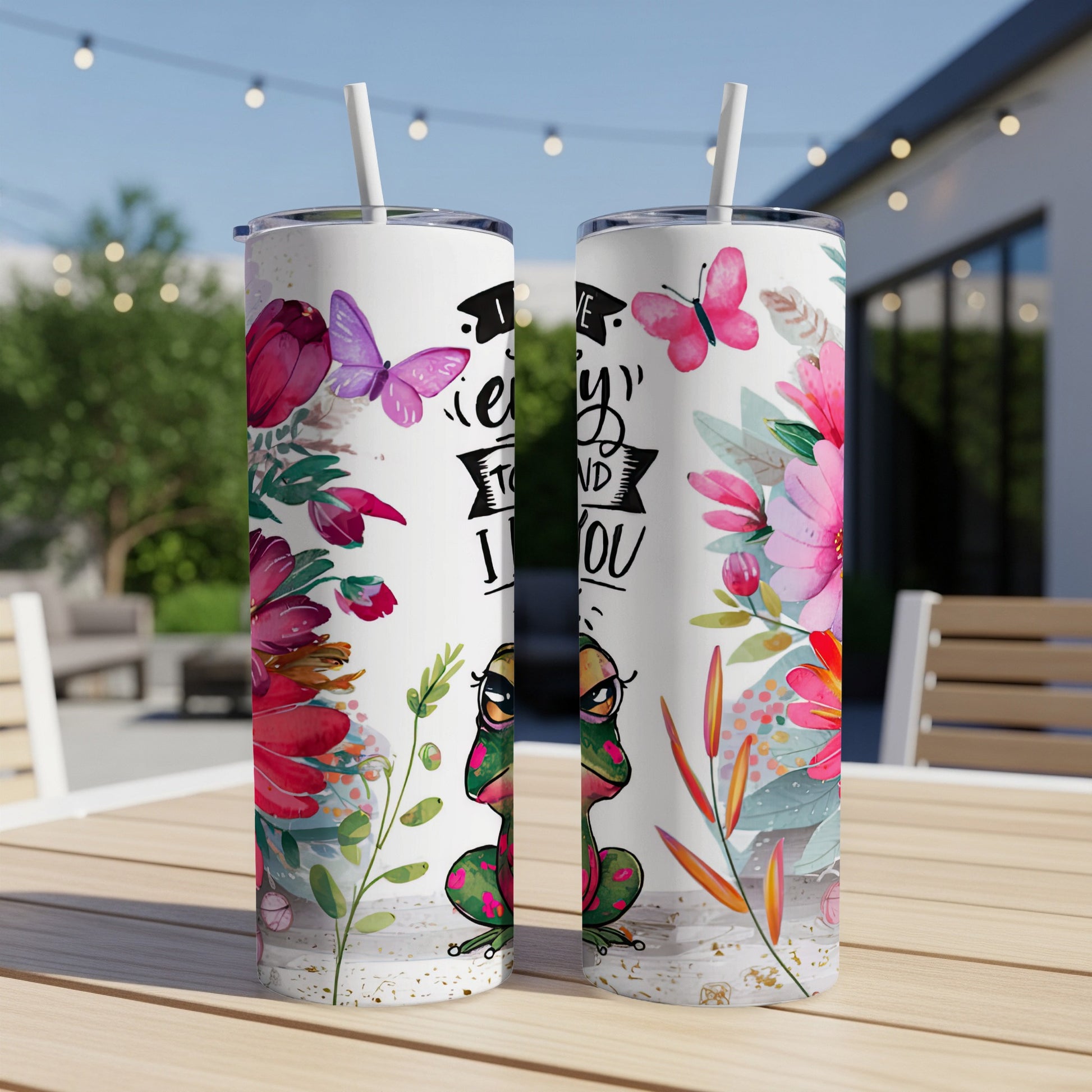 Two tumblers with a frog and floral design and text "I enjoy to mind you".