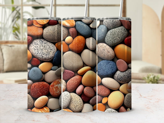Three tumblers with a colorful, textured pebble pattern.