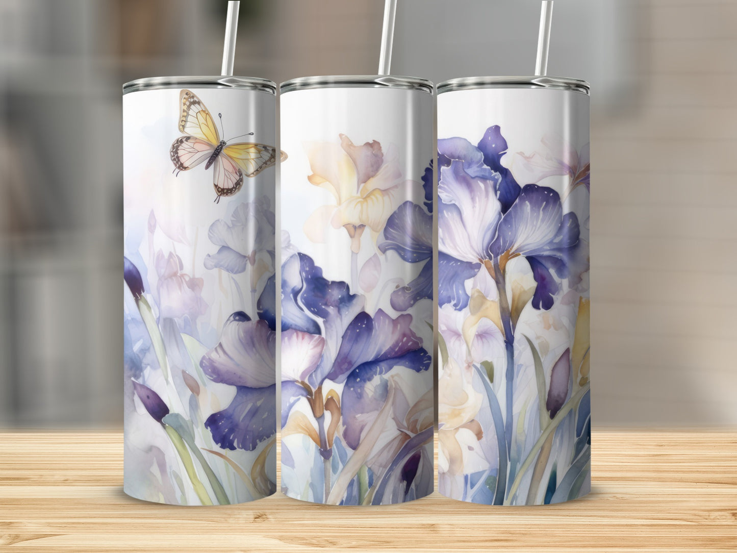 Three tumblers with purple irises and a yellow butterfly watercolor design.