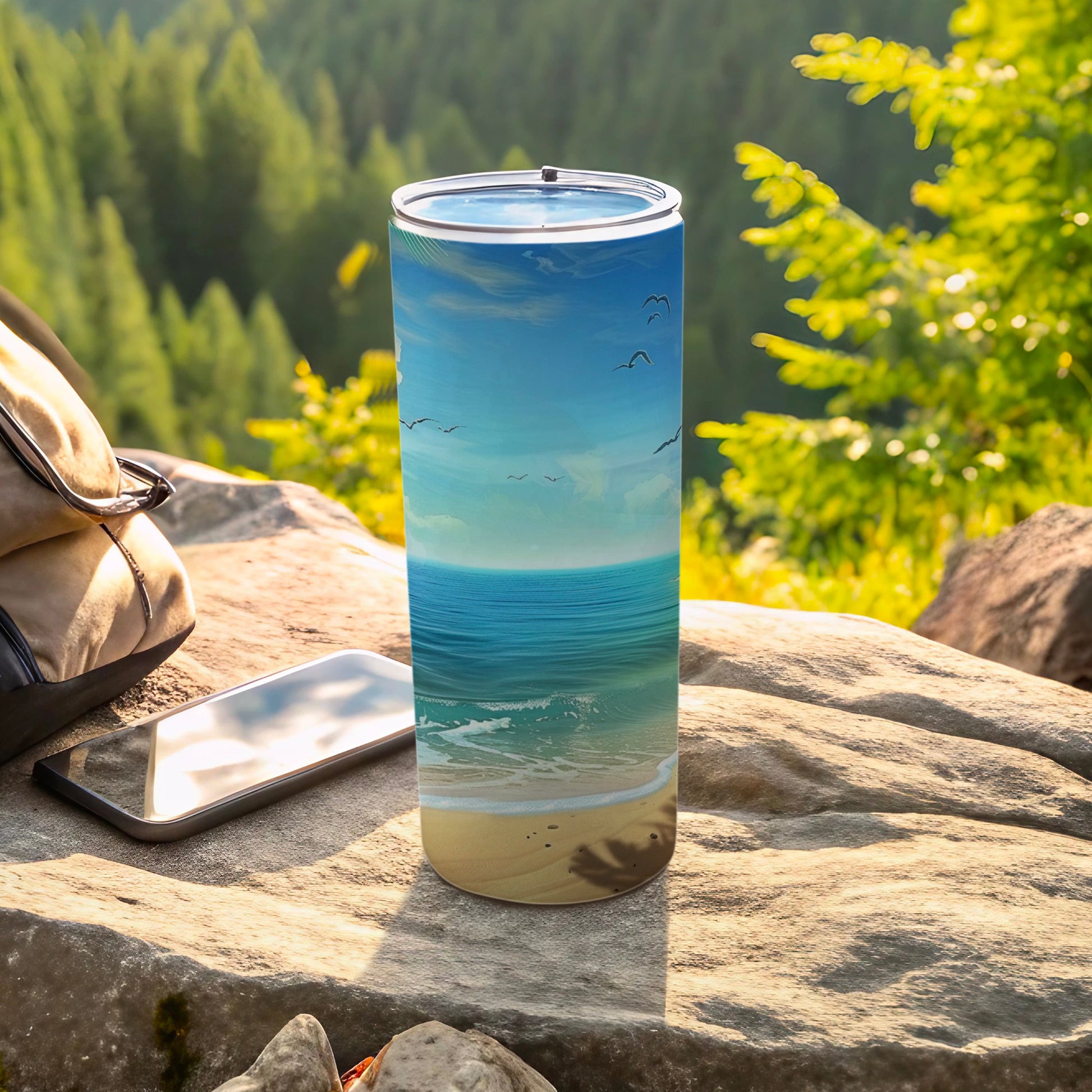Tumbler with beach scene: ocean, sand, and birds under a blue sky.