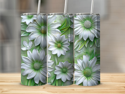 Three tumblers with embossed white flowers on a textured green background.