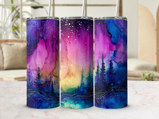 Three tumblers with a vibrant starry night forest design.