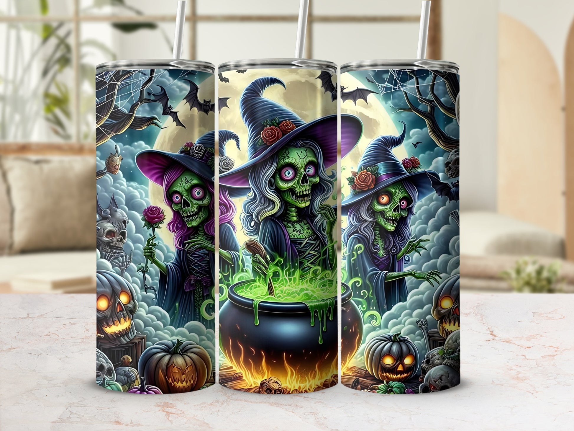 Three Halloween tumblers with witches, cauldrons, pumpkins, and bats.