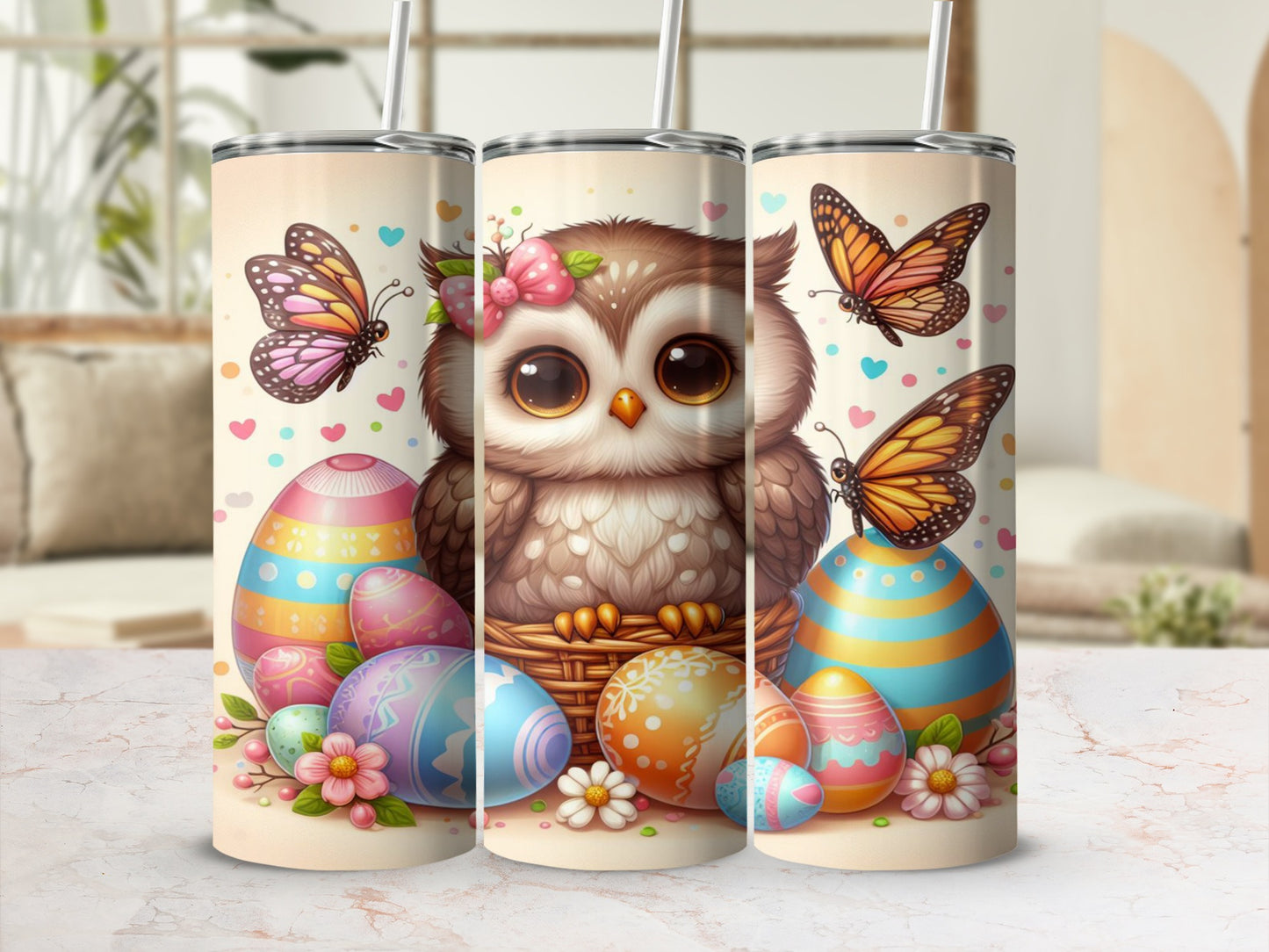 Owl with butterflies and Easter eggs on a tumbler.