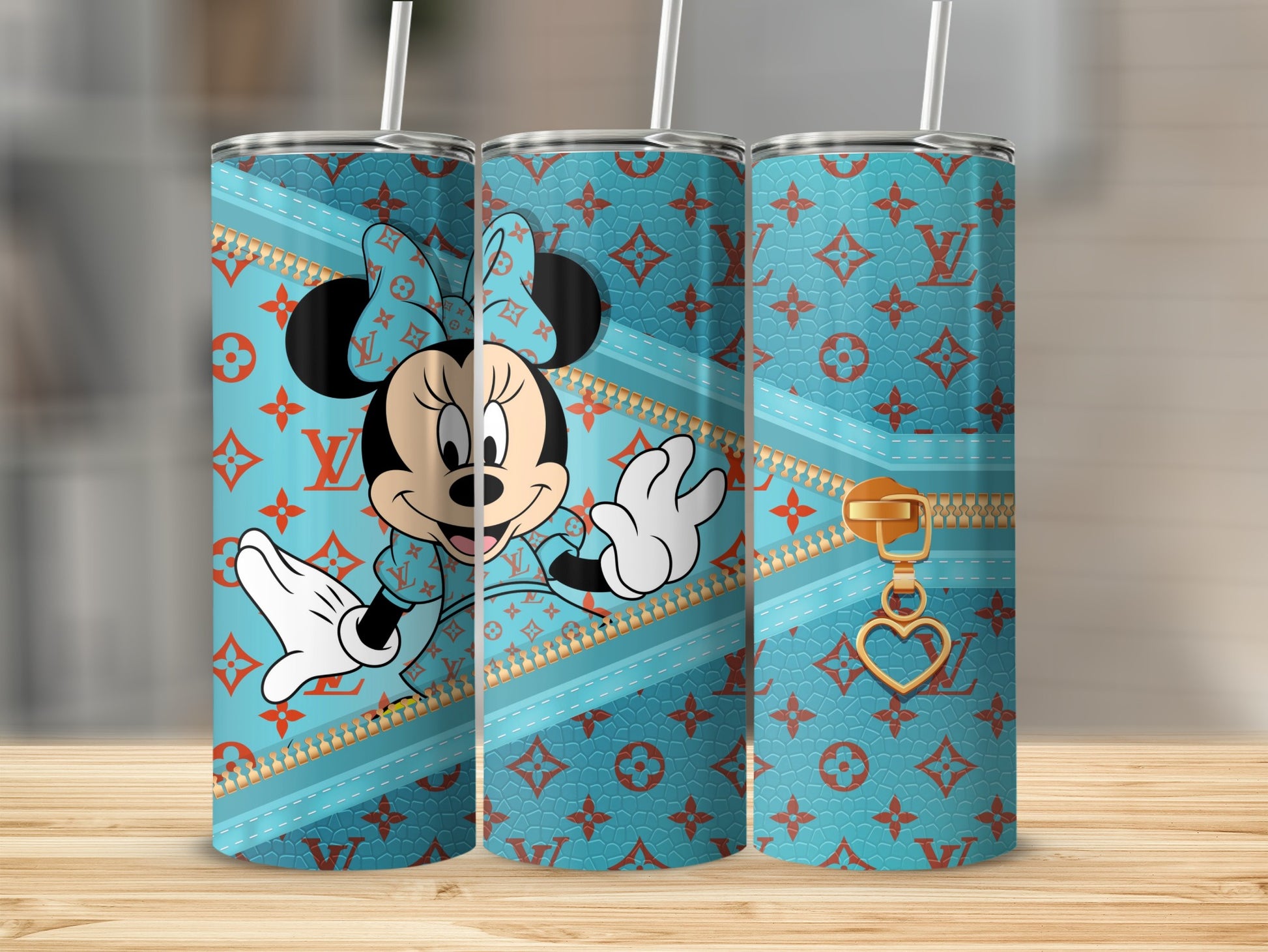 Minnie Mouse wearing a blue dress on a teal tumbler with Louis Vuitton pattern.
