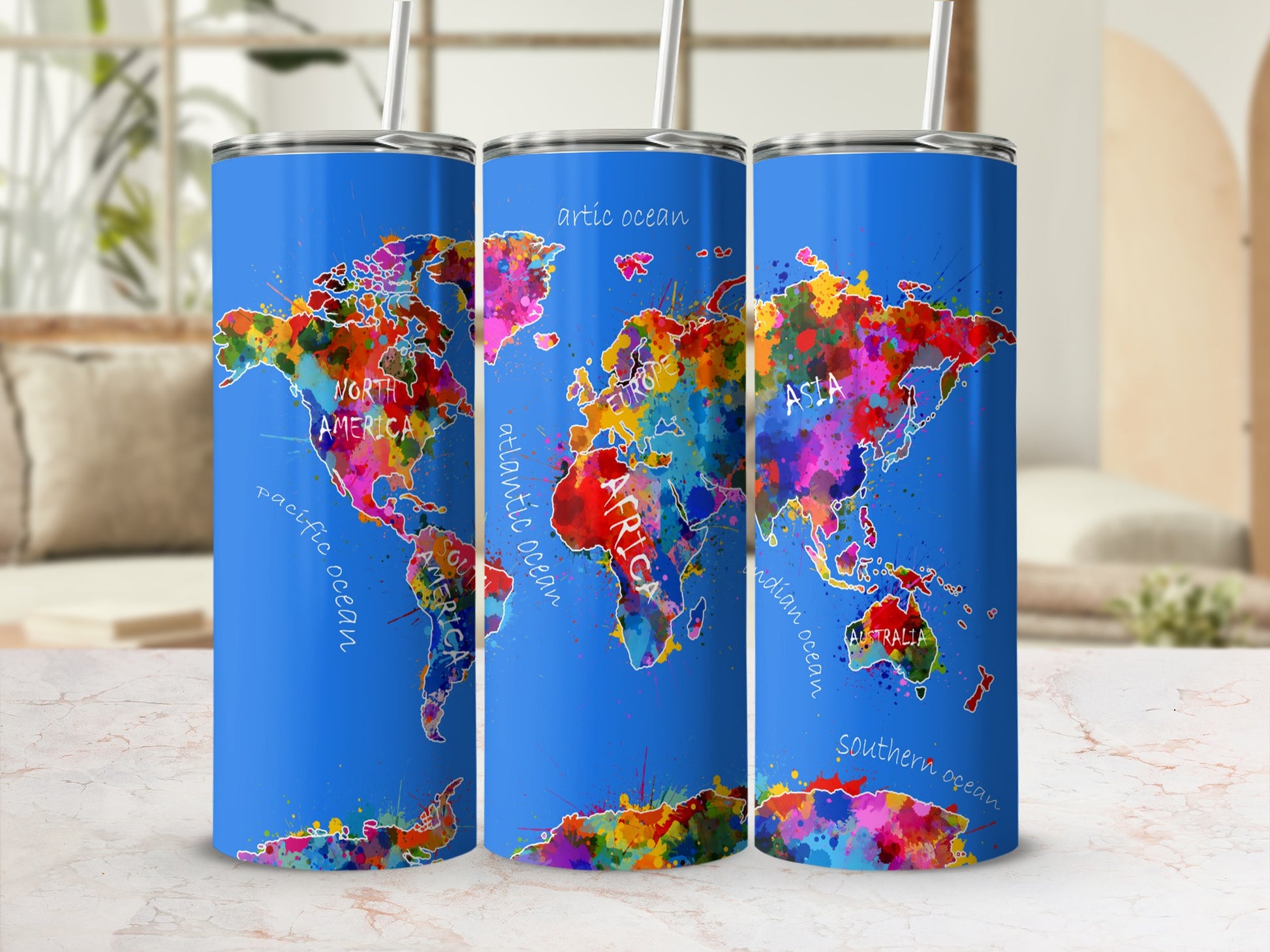 Tumblers with a colorful watercolor world map featuring North America, Europe, Asia, Africa, and Australia.