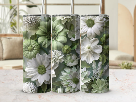 Three tumblers with detailed white and green floral patterns and straws.
