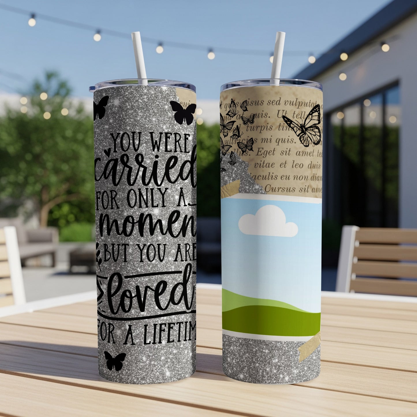 Two tumblers with glitter and butterfly designs, one with text.