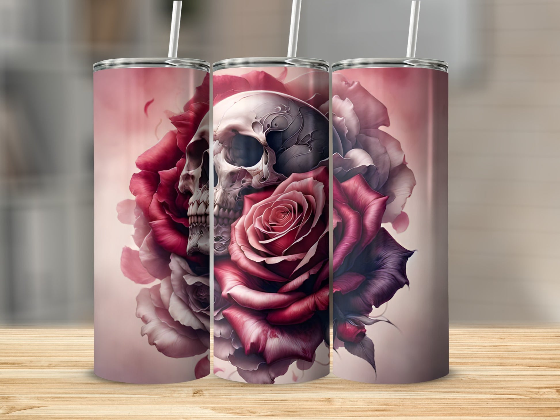 Three tumblers featuring a skull intertwined with red and purple roses.