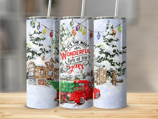 Three tumblers with a red truck, Christmas tree, and festive lights.
