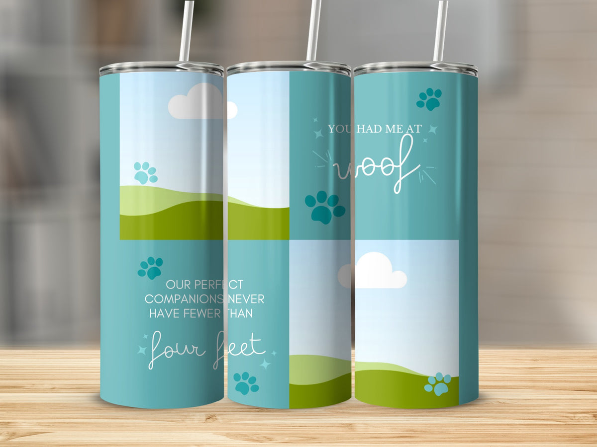 Three tumblers with teal and white designs featuring clouds, paw prints, and dog-themed text.