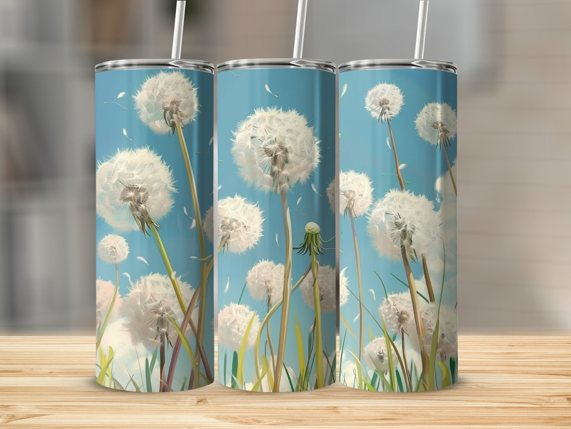 Three tumblers with dandelion fluff against a blue sky background.