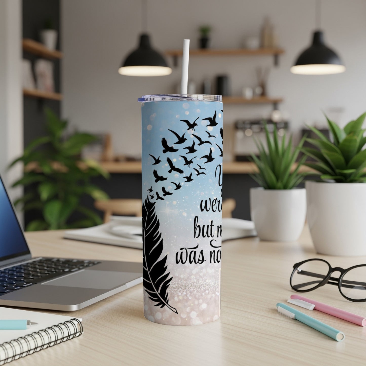 Tumbler with flock of birds, feather, and text that reads "you were born to fly."