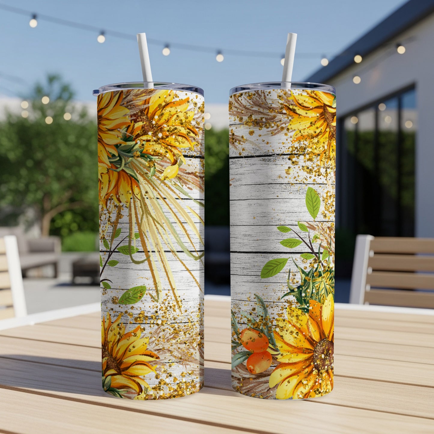 Two sunflowers and autumn foliage on weathered wood textured tumblers.