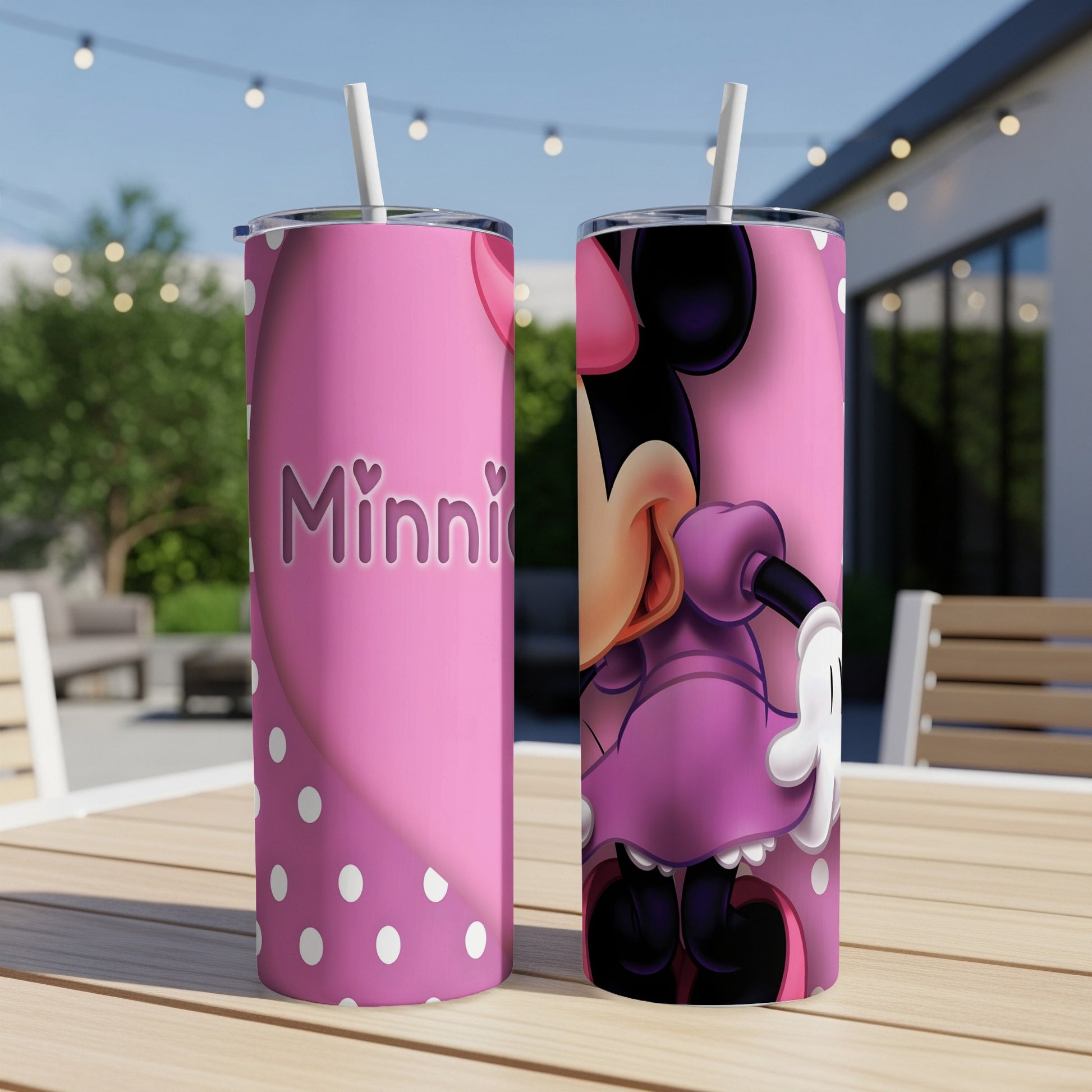 Pink Minnie Mouse tumbler with polka dots and character graphic.