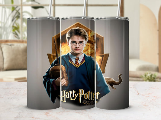 Harry Potter illustration on a tumbler with a broomstick and Hogwarts crest.