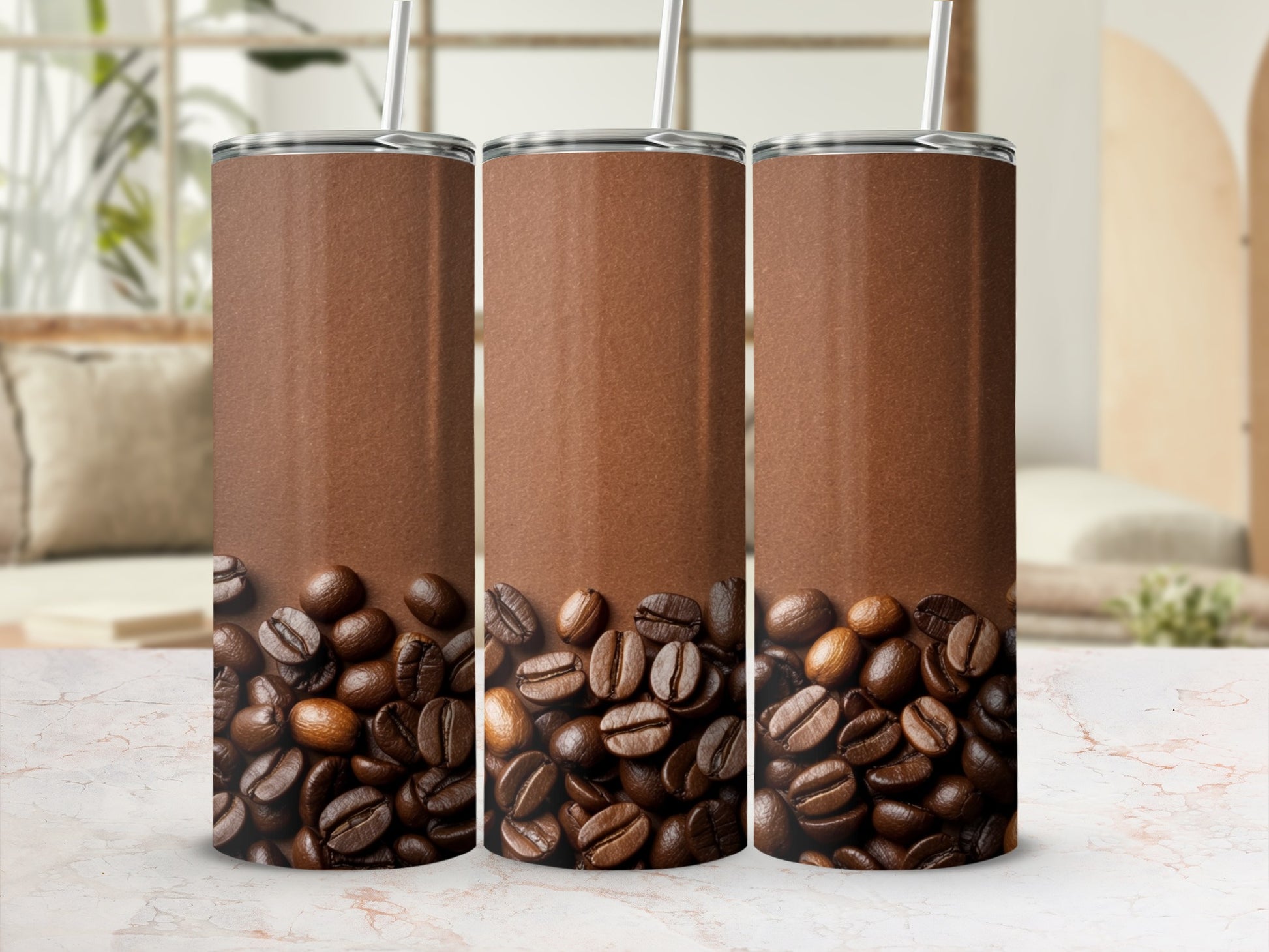 Three brown tumblers with coffee beans and straw on a marbled surface.