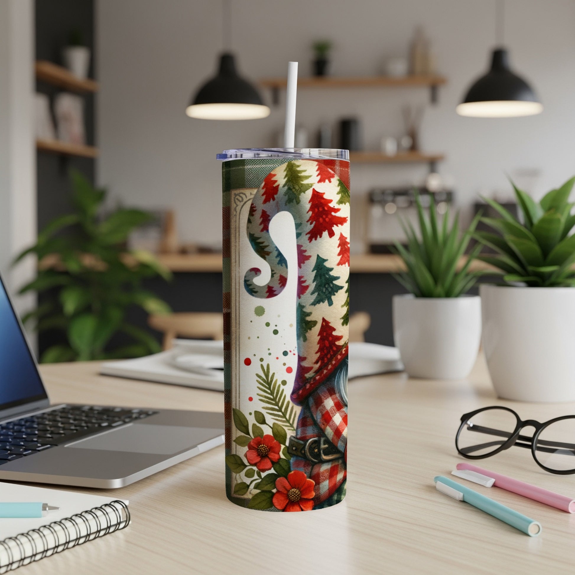 Tumbling gnome tumbler with red plaid, evergreen trees, and floral accents.