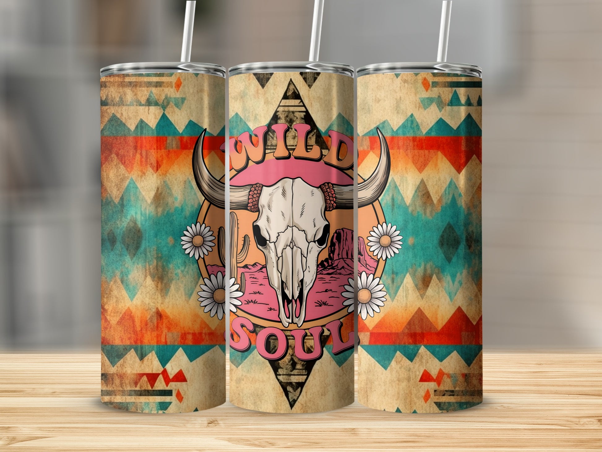 Western-themed tumbler with bull skull, desert, and flowers, reading "Wild Soul".