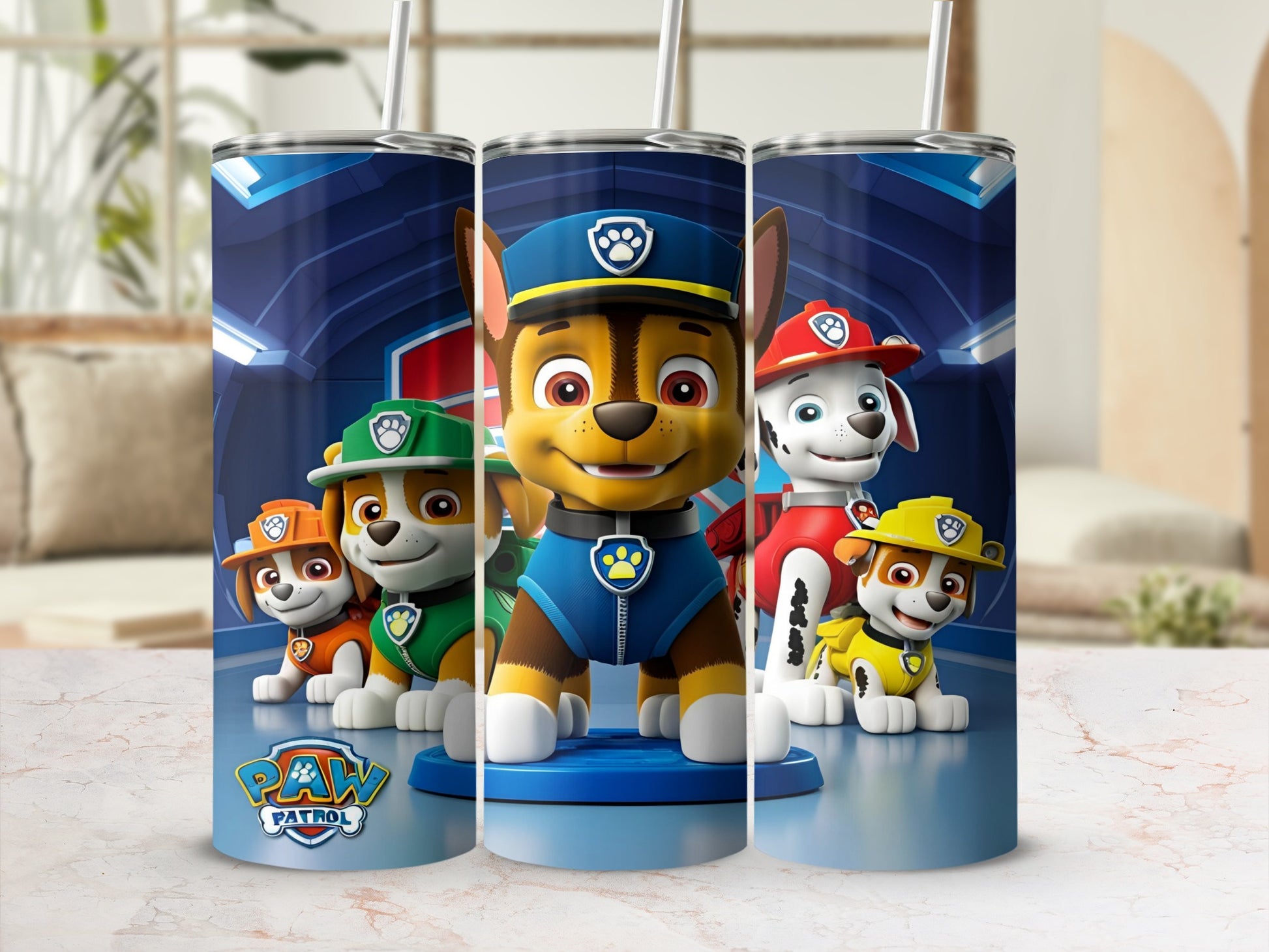 Paw Patrol characters Chase, Marshall, Rubble, and Skye on blue tumblers.